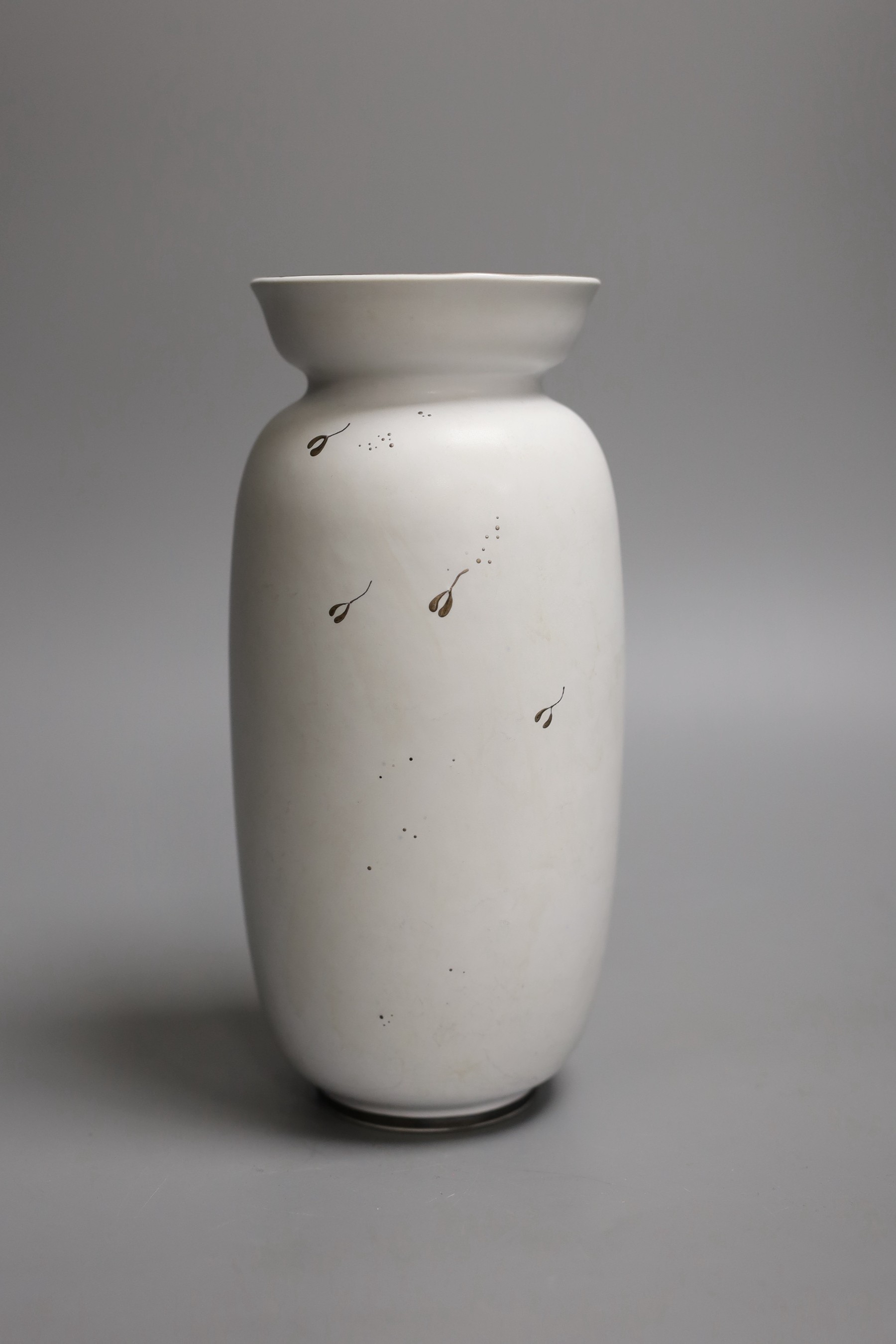 A Gustavsberg Stig Lindberg 215 shape Grazia vase decorated with a woman, vase and flowers, sprigs to the reverse, 20cm